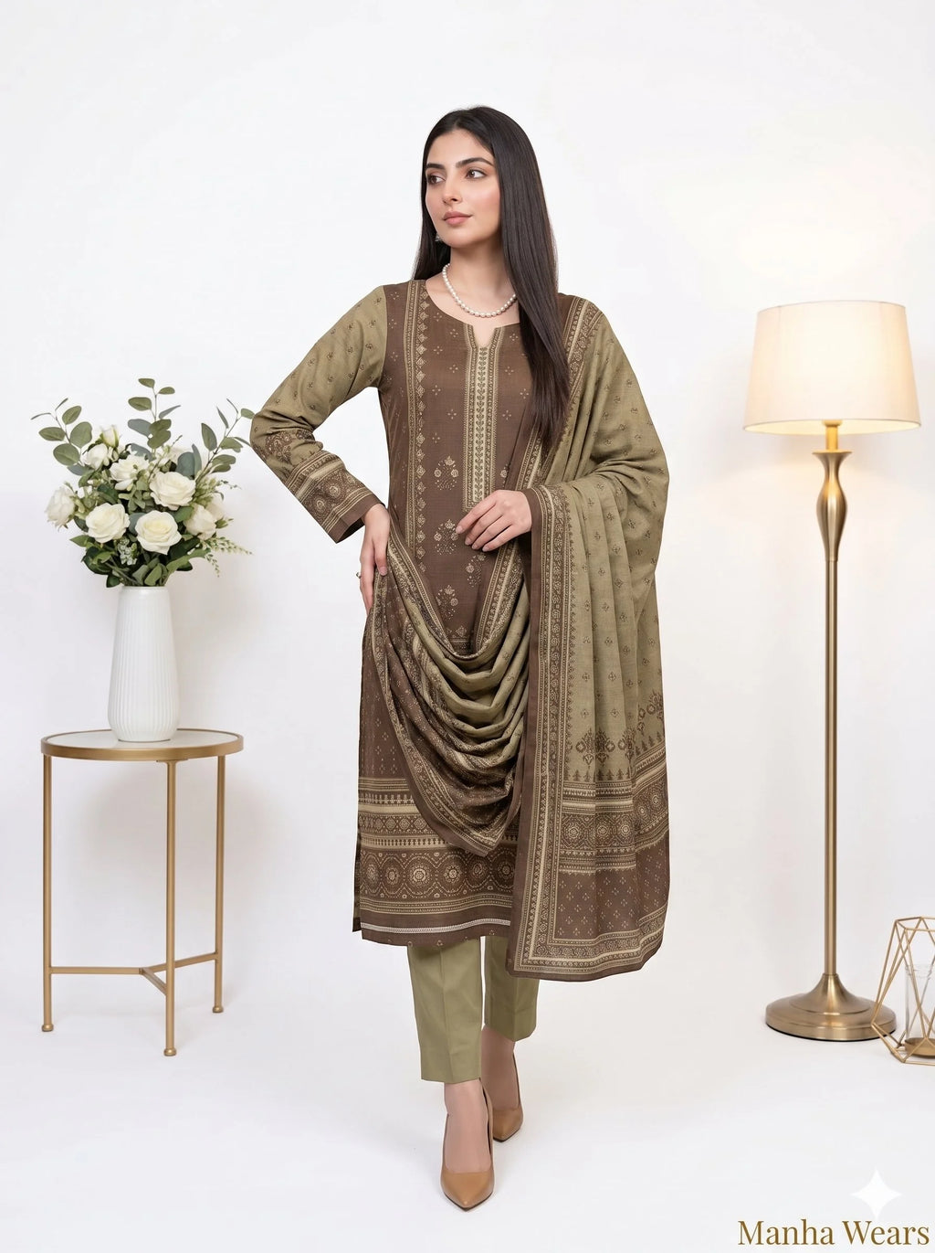 Woman wearing a green and brown traditional outfit with a white background