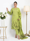 Woman wearing a green floral outfit with a white background